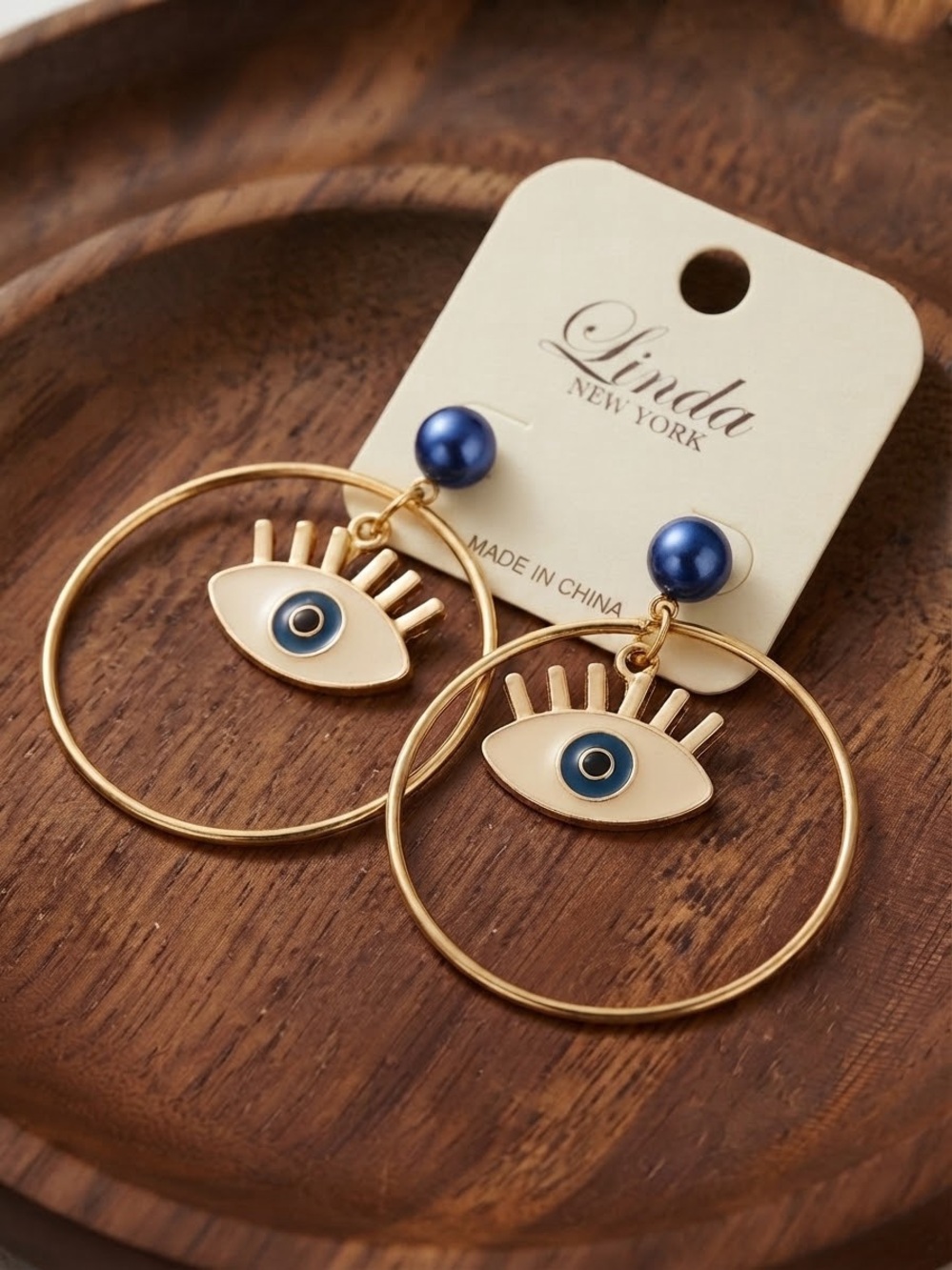 Gold Hoop Earrings with Blue Eye Accent